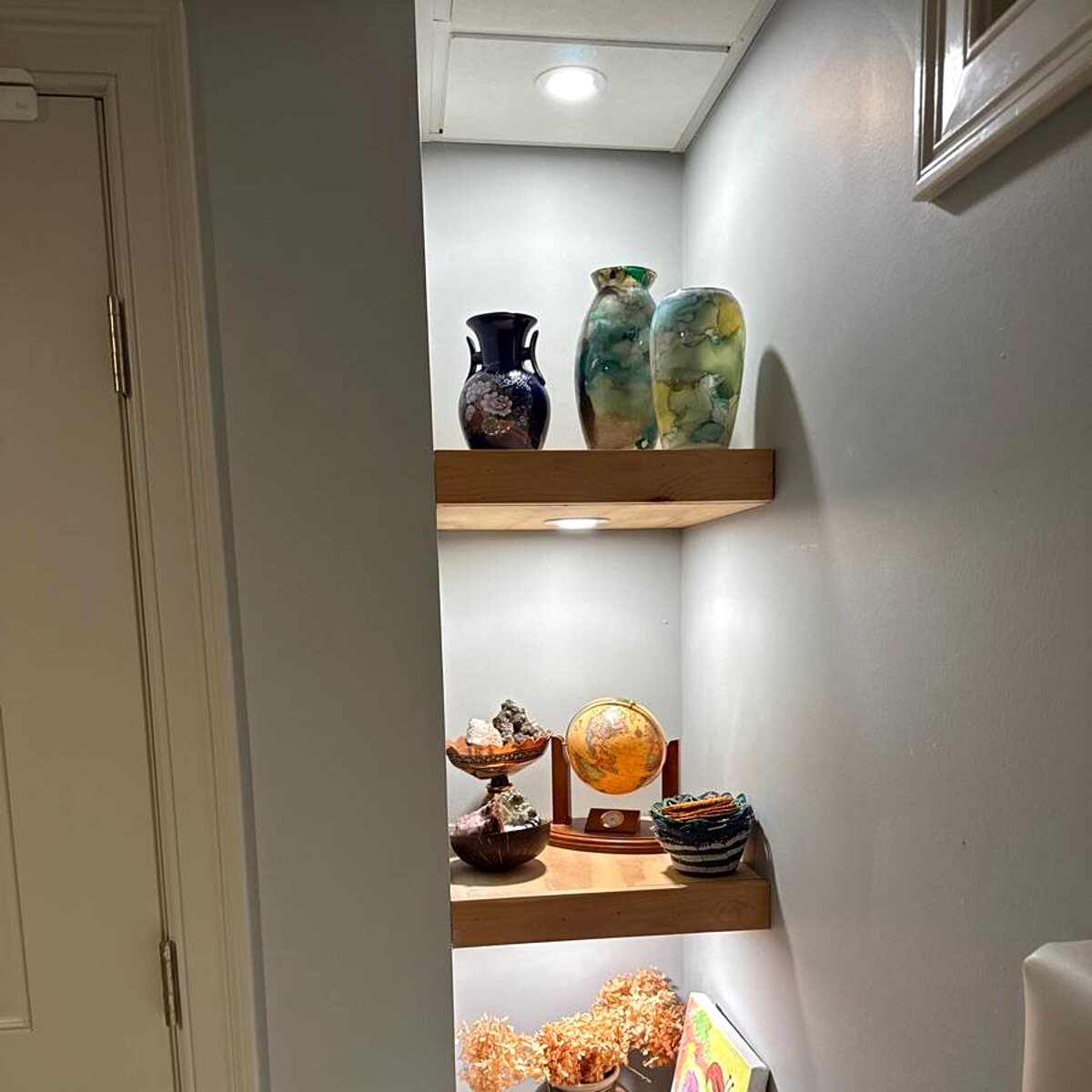 Floating shelves installed in a corner