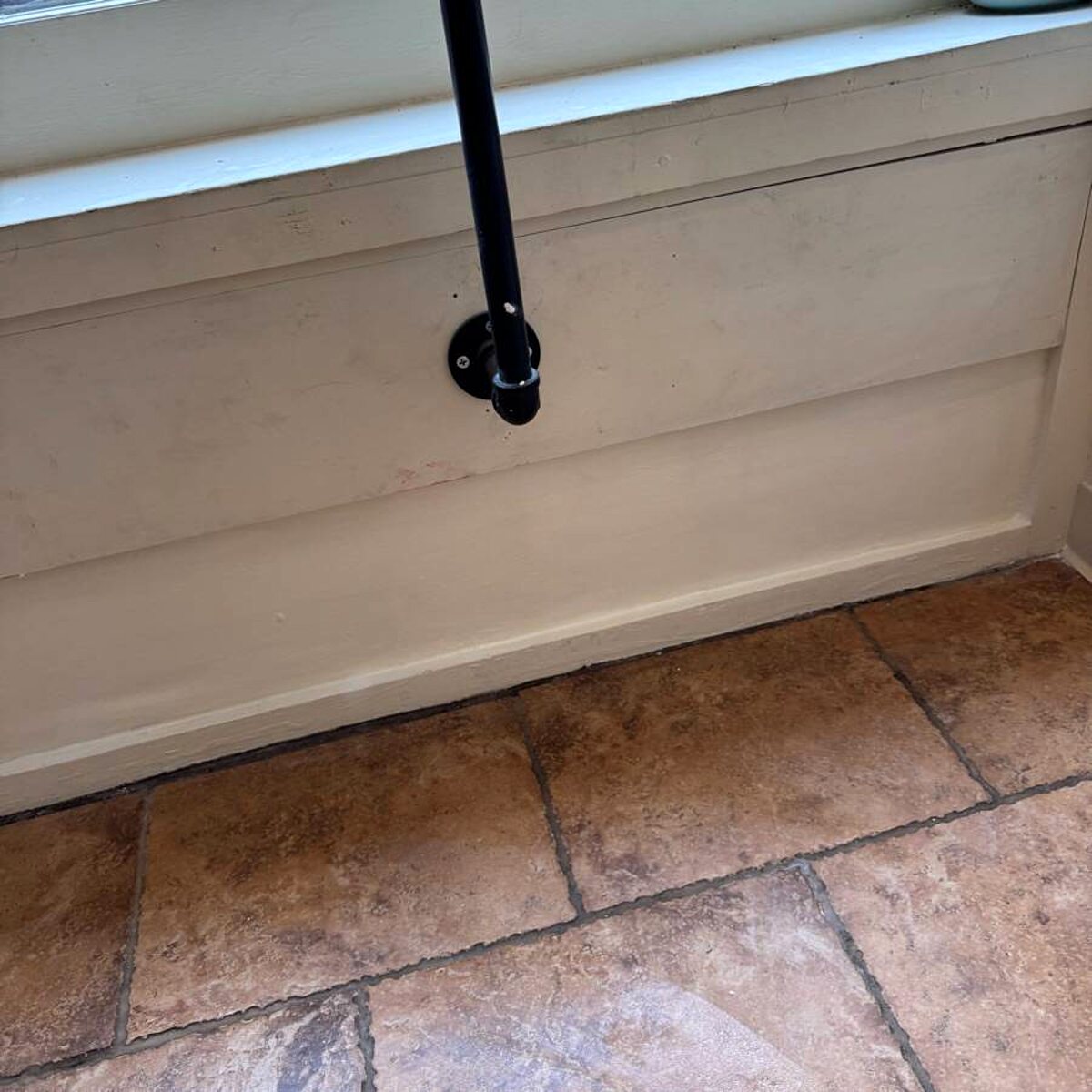 Repaired and color-matched wall at a commercial space