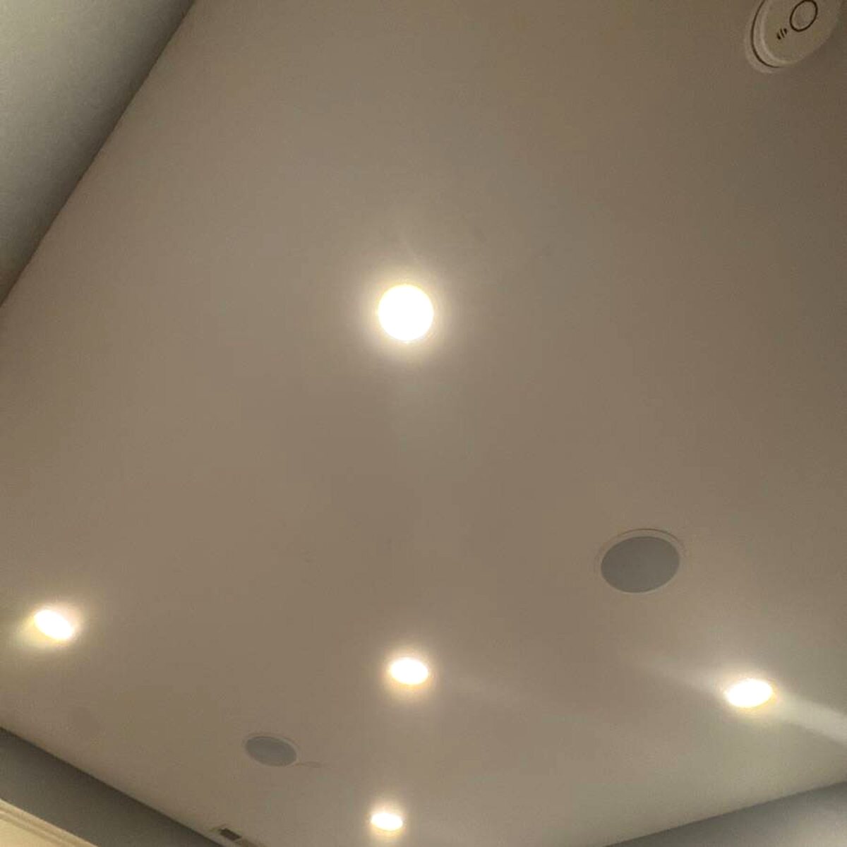 Recessed ceiling lights and in-ceiling speakers
