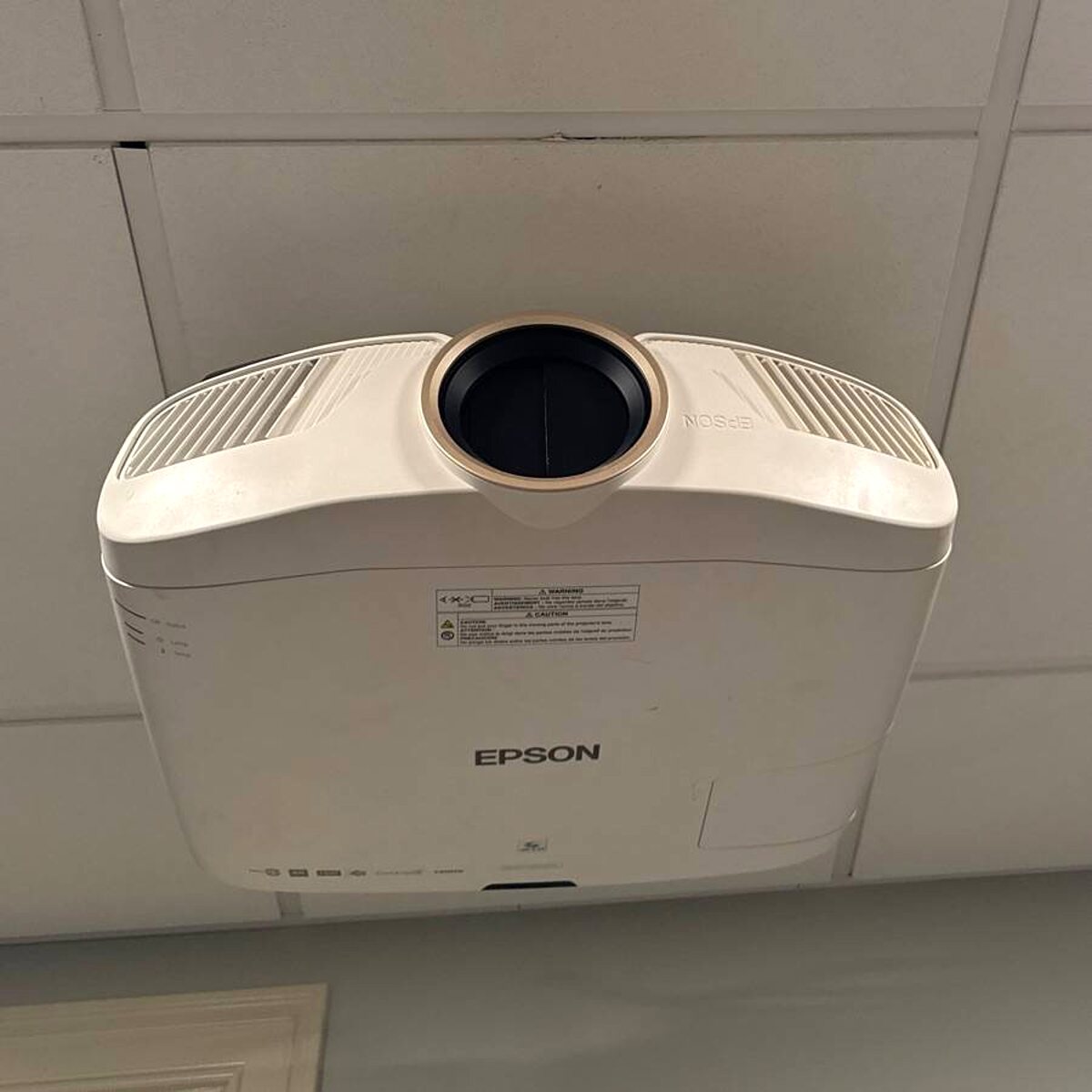 Ceiling-mounted projector for a home theater